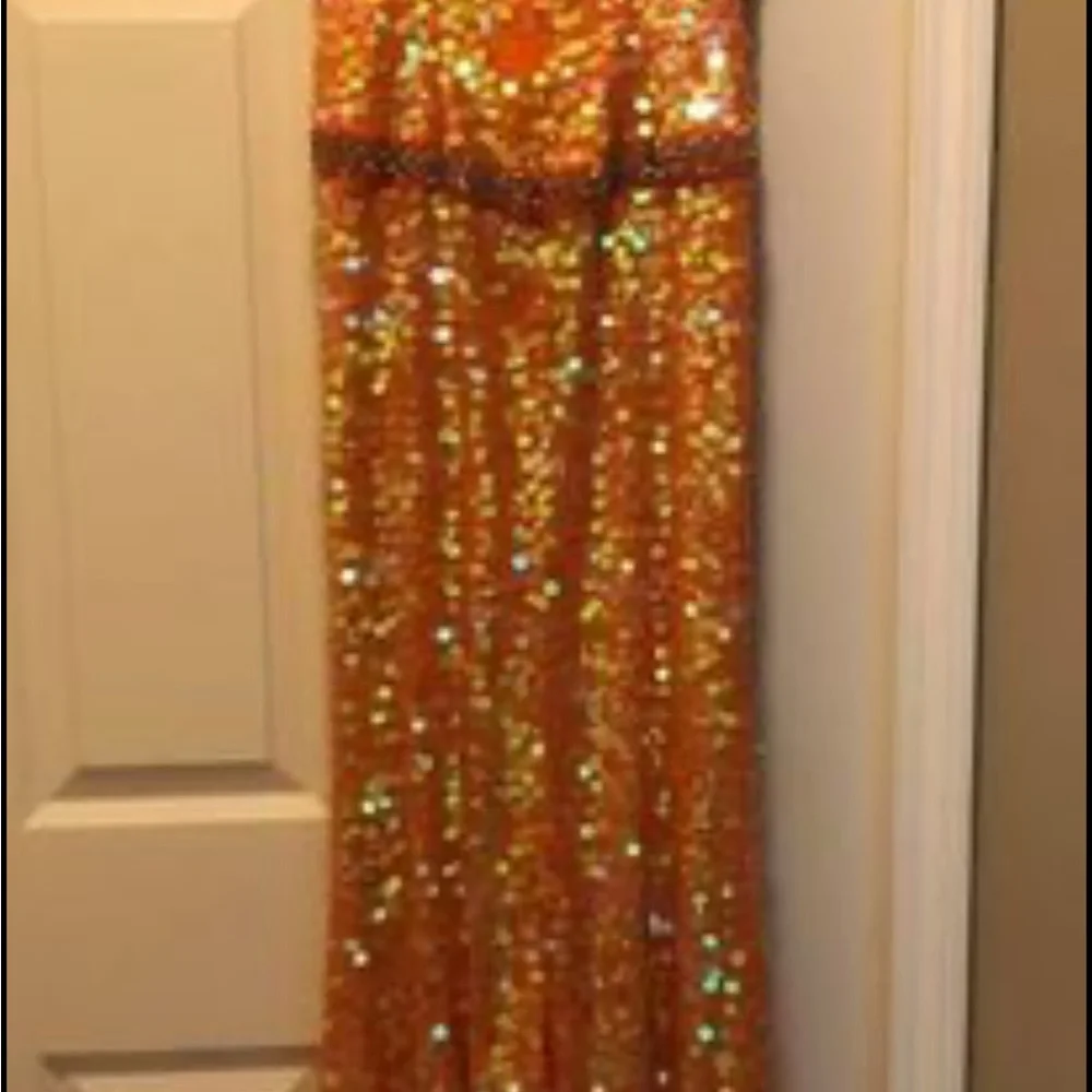Beautiful beaded, coral prom, dress, fitted at waist, spaghetti straps. - Picture 5 of 9